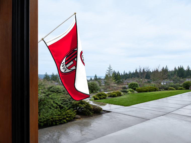 AC Milan Authentic Gameday Flag — approved one-scene environment view — EXO R89 — item_id=euro-soccer-ac-milan — source_sha256=44e55d66623d3d54370a9fcbe3765bc99612d3db3345b14ef520172c53e2bdde