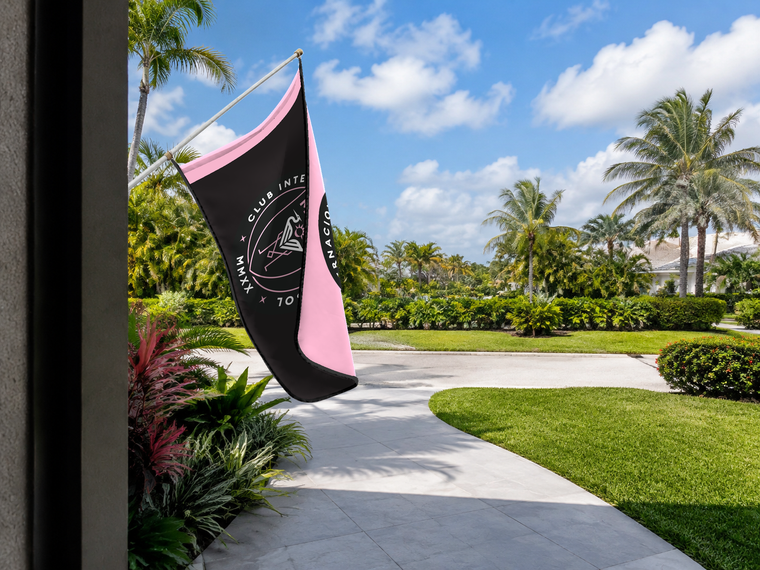 Inter Miami CF Authentic Gameday Flag — approved one-scene environment view — EXO R89 — item_id=mls-inter-miami-cf — source_sha256=121ad370eddcf5fd4b3ea6e4f6a2d87d4bce10878faf53b34aac945aa1a6a4f6