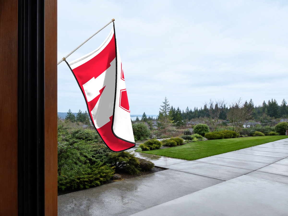 Nebraska Cornhuskers Authentic Gameday Flag — approved one-scene environment view — EXO R89 — item_id=ncaa-fbs-nebraska-cornhuskers — source_sha256=7cecc0a4d265e8a54fd74d0b0ec5ec15e2b64f73dc17084caf69eeefaf2e41ab