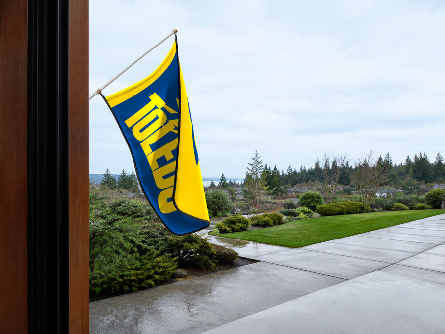 Toledo Rockets Authentic Gameday Flag — approved one-scene environment view — EXO R89 — item_id=ncaa-fbs-toledo-rockets — source_sha256=807d12d4ab6d2705e24477834eedd7baadd837eaf5006f7f63786ceb12e21476