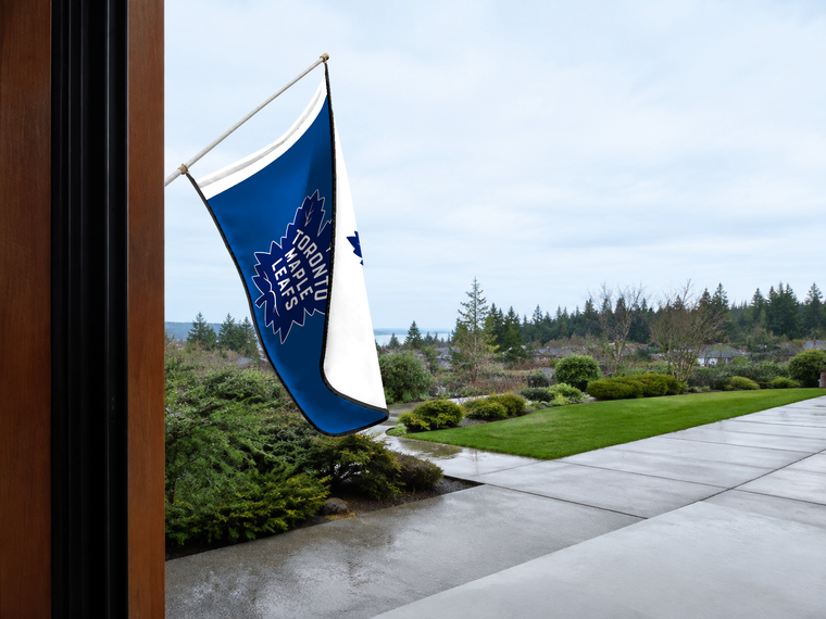 Toronto Maple Leafs Authentic Gameday Flag — approved one-scene environment view — EXO R89 — item_id=nhl-toronto-maple-leafs — source_sha256=0c64685b30f4ef1a353c7ebcabeae108d14eba8a092d3387be6eaf3fe7da1675