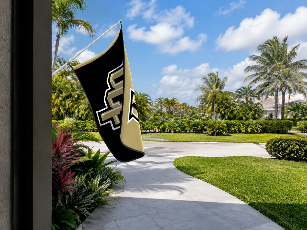 UCF Knights Authentic Gameday Flag — approved one-scene environment view — EXO R89 — item_id=ncaa-fbs-ucf-knights — source_sha256=b29c037ab34d5e77a7007fcf077bc6f050d2728808cdb623ec3430de65382936