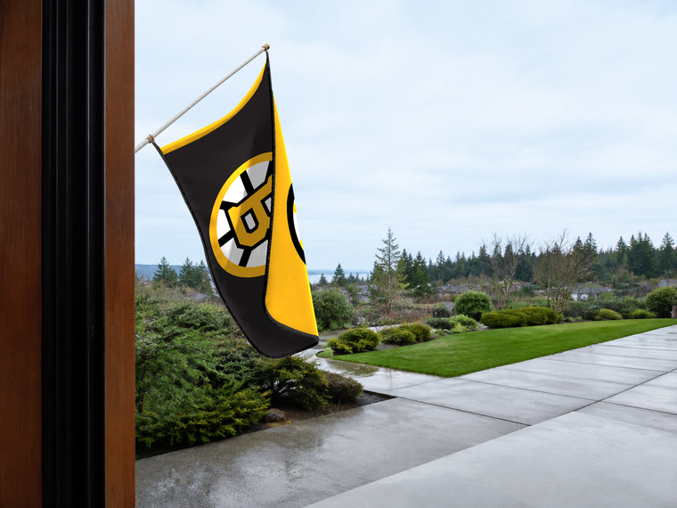 Boston Bruins Authentic Gameday Flag — approved one-scene environment view — EXO R89 — item_id=nhl-boston-bruins — source_sha256=da121ecd0a1fef12a01b84dbfc8f3e0b1bccb6213d6c6fc674ea6210bf082b21