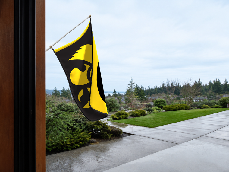 Iowa Hawkeyes Authentic Gameday Flag — approved one-scene environment view — EXO R89 — item_id=ncaa-fbs-iowa-hawkeyes — source_sha256=b0845dc8fe91694978b35d8a9236989bf59f474f81fde2f60dfad5dd8d83d767