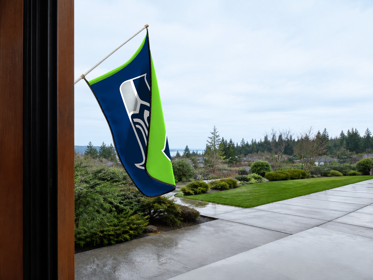 Seattle Seahawks Authentic Gameday Flag — approved one-scene environment view — EXO R89 — item_id=nfl-seattle-seahawks — source_sha256=afaf9007e74c3ee832de1ce6c9bc7c1dffa3c646f0b651a7d99cec5c448300dc