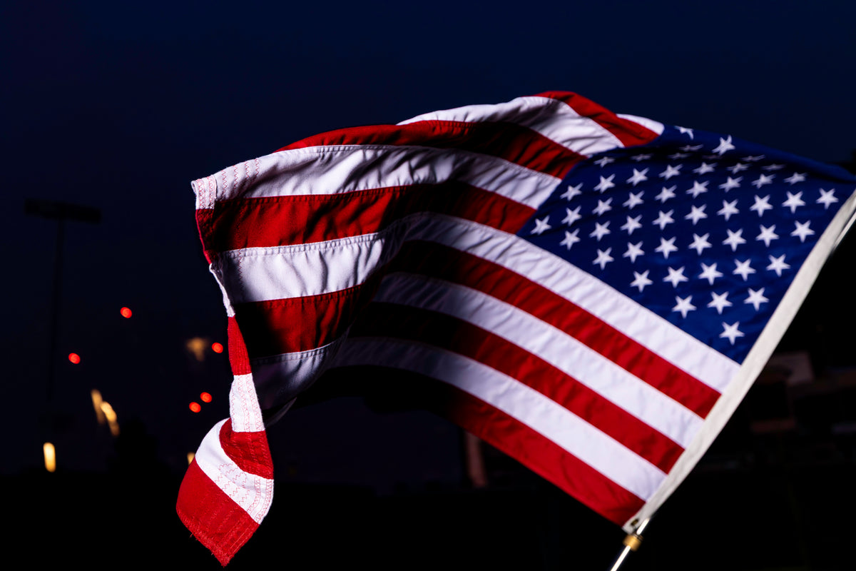 EXO PHOTOGRAPHY / EDER USA FLAG / REINFORCED FLY / close view of reinforced fly-end stitching in motion / real product photography