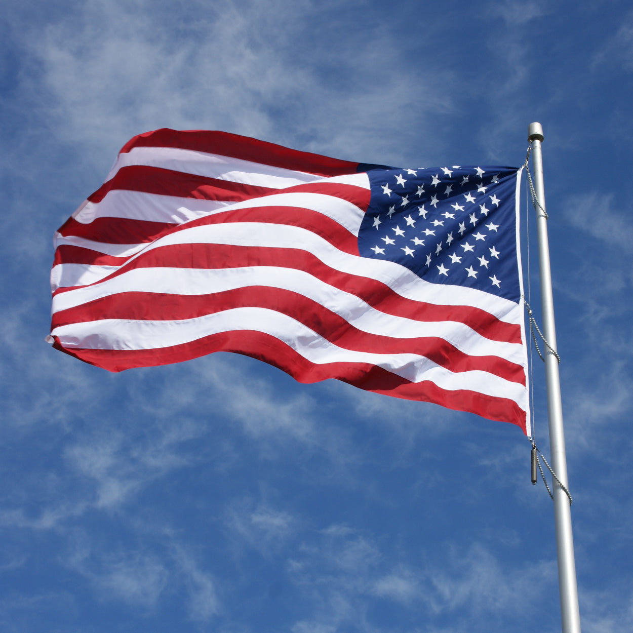 EDER SUPPLIER / Poly-Max United States flag flying on a commercial aluminum flagpole