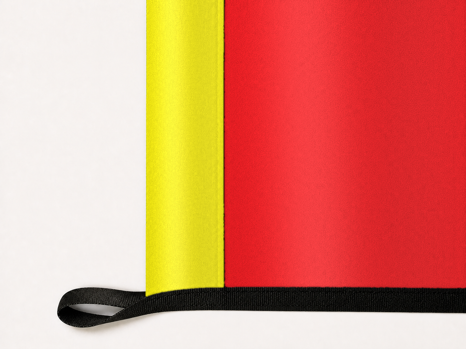 United States Marine Corps Flag Authentic Gameday Flag underside and personalization construction view — continuous restrained woven-satin Marine Corps Gold Header header, textured Scarlet Field face, lower black loop and perimeter webbing — source_sha256=dc41281700c5f06856cf7d6be445147138f70941a4a7b17d71996eb518e2aa48