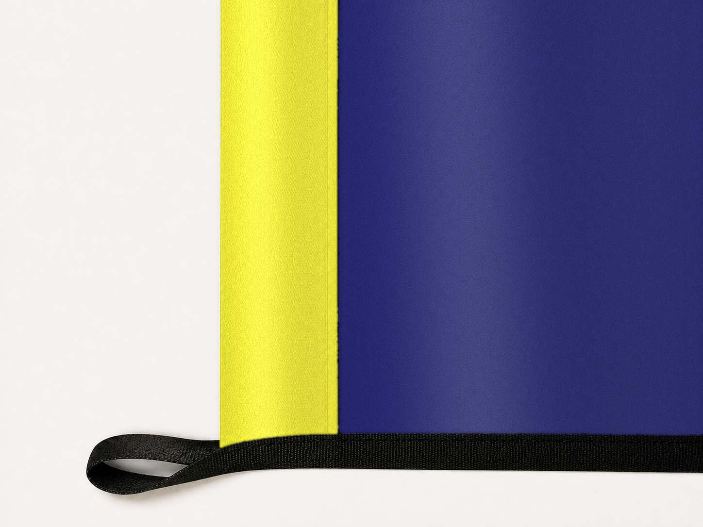 United States Navy Flag Authentic Gameday Flag underside and personalization construction view — continuous restrained woven-satin Navy Gold Header header, textured Navy Blue Field face, lower black loop and perimeter webbing — source_sha256=0f2bdf47d19226e0f2985120a39c60b7070dd14dbf3bd3cd33e5b23c4a78ce24
