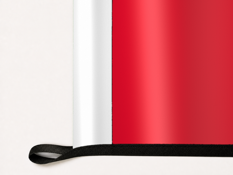 AC Milan Authentic Gameday Flag underside and personalization construction view — continuous restrained woven-satin AC Milan Accent header, textured AC Milan Primary face, lower black loop and perimeter webbing — source_sha256=a63cd92b7dcd9b2cd763a158a639ee00bd693824506f54596b5ced670932dcc2