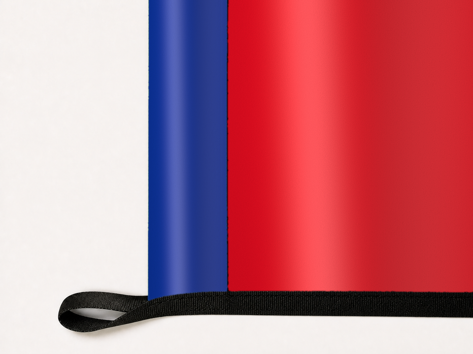 Arsenal Authentic Gameday Flag underside and personalization construction view — continuous restrained woven-satin Arsenal Accent header, textured Arsenal Primary face, lower black loop and perimeter webbing — source_sha256=9c02c376628dab907cb9f0fe72b60981e1a08f2342c204b85a74fa771763fdc4