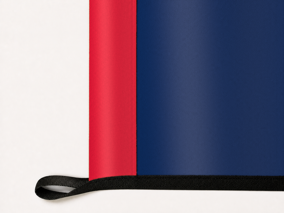 Cleveland Guardians Authentic Gameday Flag underside and personalization construction view — continuous restrained woven-satin Cleveland Guardians Accent header, textured Cleveland Guardians Primary face, lower black loop and perimeter webbing — source_sha256=6a6071345dcb2d212f18774b5c37e7810fecf4309f1b8bee20159541c9eef7b7