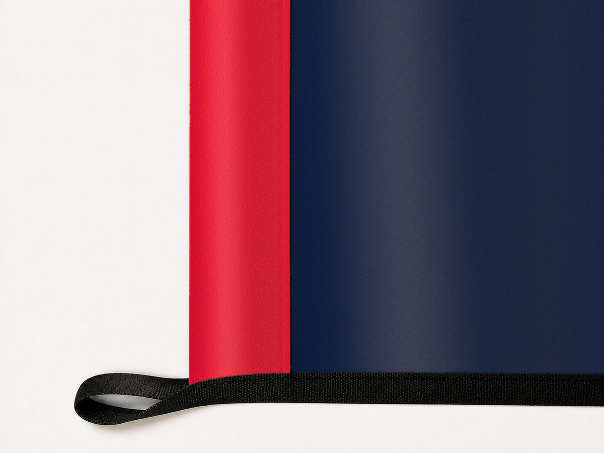 Minnesota Twins Authentic Gameday Flag underside and personalization construction view — continuous restrained woven-satin Minnesota Twins Accent header, textured Minnesota Twins Primary face, lower black loop and perimeter webbing — source_sha256=439a4bd6c9ce696bd8832e38d1d3eb79ff195a6e440b2dbacbeb5eccb2aea0dc