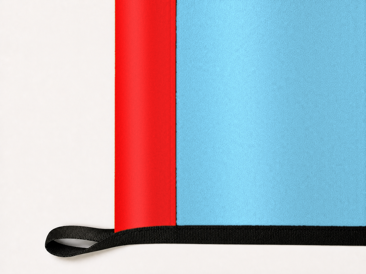 Chicago Fire FC Authentic Gameday Flag underside and personalization construction view — continuous restrained woven-satin Chicago Fire FC Accent header, textured Chicago Fire FC Primary face, lower black loop and perimeter webbing — source_sha256=311617e8def52fa65525e09fb9309f0ca0be10264cfcbf14cd1a93d58babf4b5