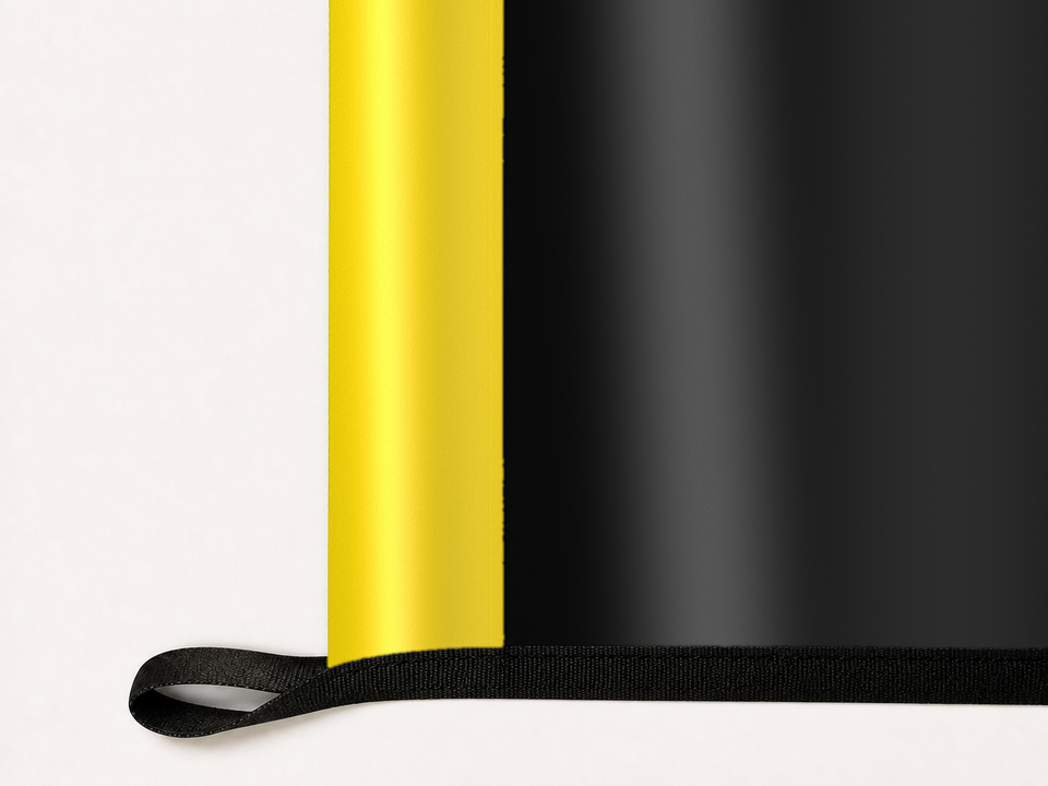 Columbus Crew Authentic Gameday Flag underside and personalization construction view — continuous restrained woven-satin Columbus Crew Accent header, textured Columbus Crew Primary face, lower black loop and perimeter webbing — source_sha256=e5f45f1922b9e3fa76f2d708b2bb95805ec255eabb4736f21c656bab281a5e6d