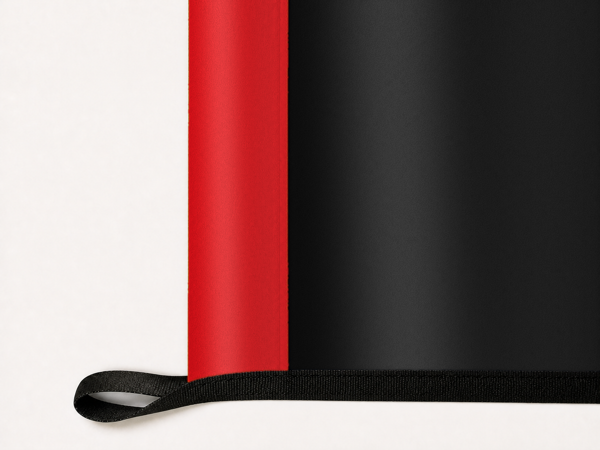 D.C. United Authentic Gameday Flag underside and personalization construction view — continuous restrained woven-satin D.C. United Accent header, textured D.C. United Primary face, lower black loop and perimeter webbing — source_sha256=450d0ec564efda983b38269d72b25aad8d618c85a08b53c1b5d3aa7c4a6d4e81