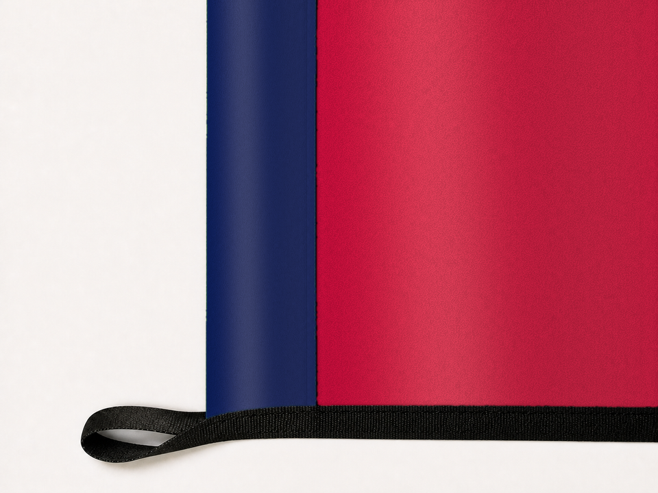 FC Dallas Authentic Gameday Flag underside and personalization construction view — continuous restrained woven-satin FC Dallas Accent header, textured FC Dallas Primary face, lower black loop and perimeter webbing — source_sha256=faf933c9dba32911768af42040b5ffb7450c02264851b9383db85ae652d5cc01