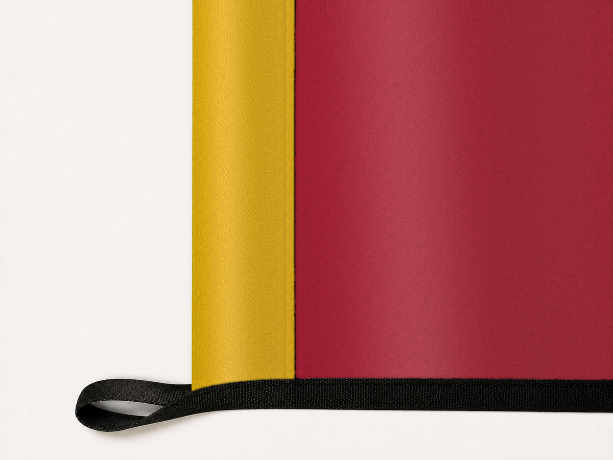 Real Salt Lake Authentic Gameday Flag underside and personalization construction view — continuous restrained woven-satin Real Salt Lake Accent header, textured Real Salt Lake Primary face, lower black loop and perimeter webbing — source_sha256=38762fbef8d233dab455eda37b46365dbd5c68c6ddab5d4e3be9eaa944097208
