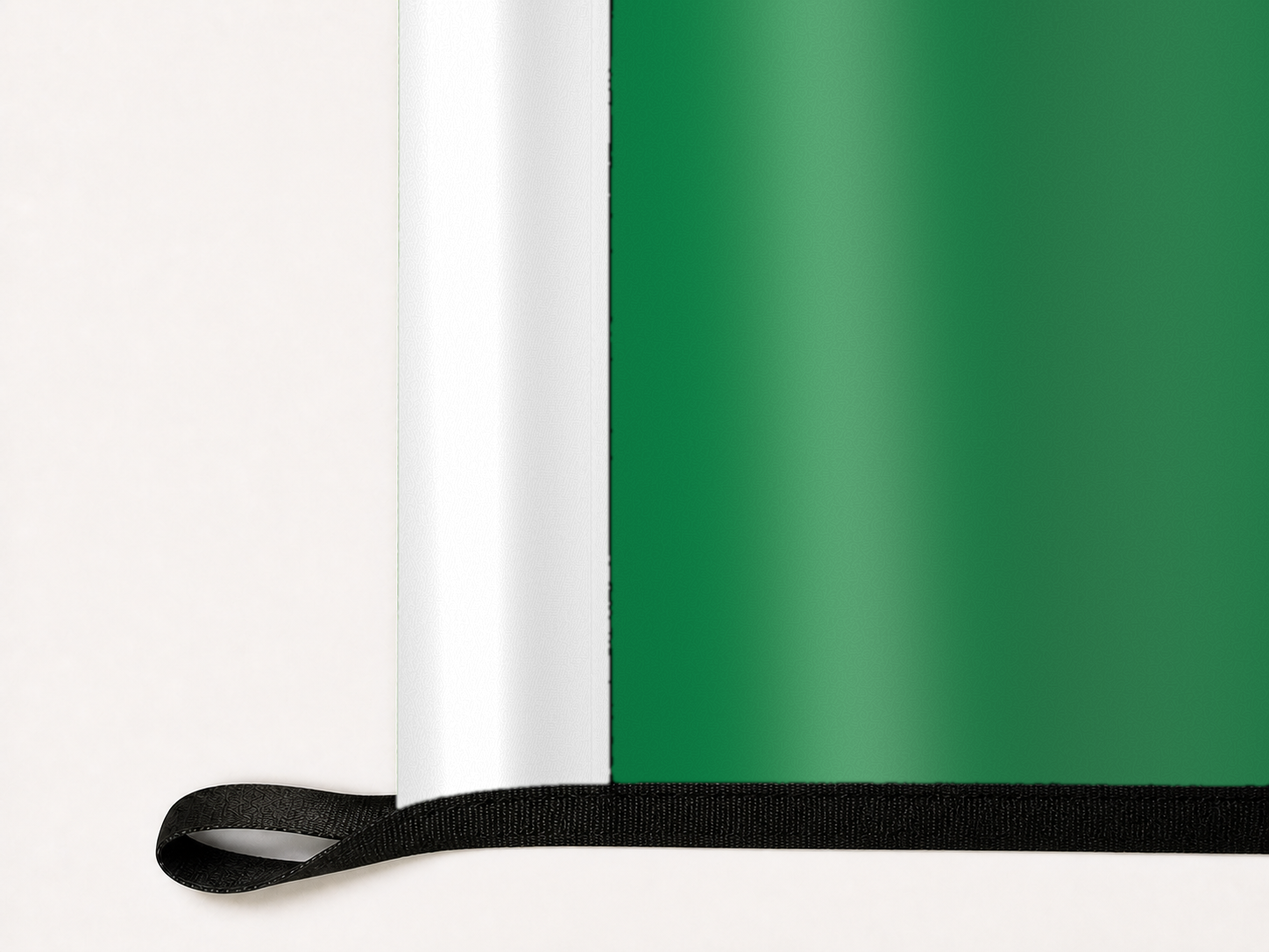 Boston Celtics Authentic Gameday Flag underside and personalization construction view — continuous restrained woven-satin Boston Celtics Accent header, textured Boston Celtics Primary face, lower black loop and perimeter webbing — source_sha256=bb57dd0c33a208ffae823867f9d71e13bd72b4ffdccb186b7a7de51780d4c7e4