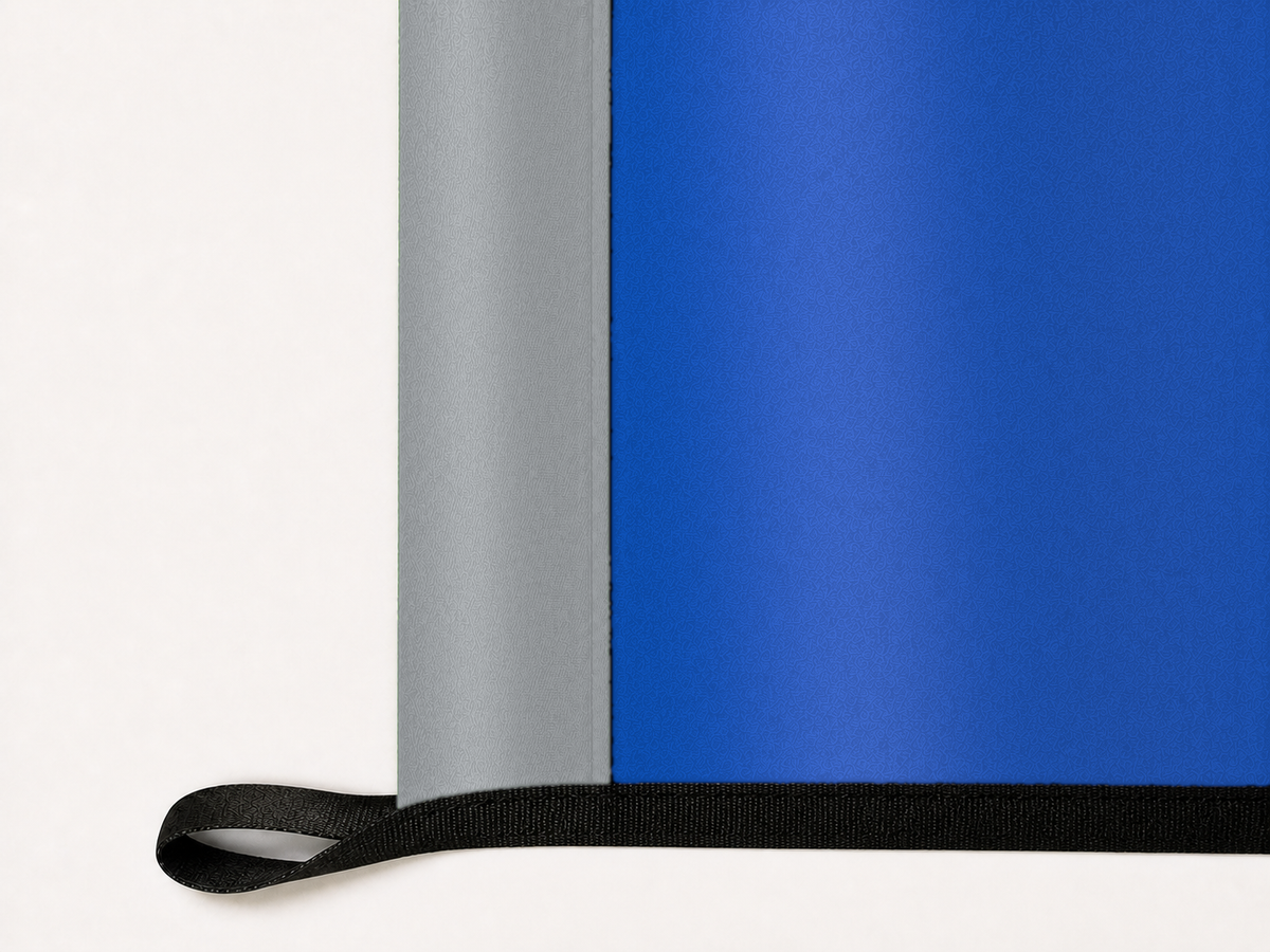 Orlando Magic Authentic Gameday Flag underside and personalization construction view — continuous restrained woven-satin Orlando Magic Accent header, textured Orlando Magic Primary face, lower black loop and perimeter webbing — source_sha256=8c56ae1b1ba9df8f477495ed5558180f353e4e6e44270815473cec9e918237f8