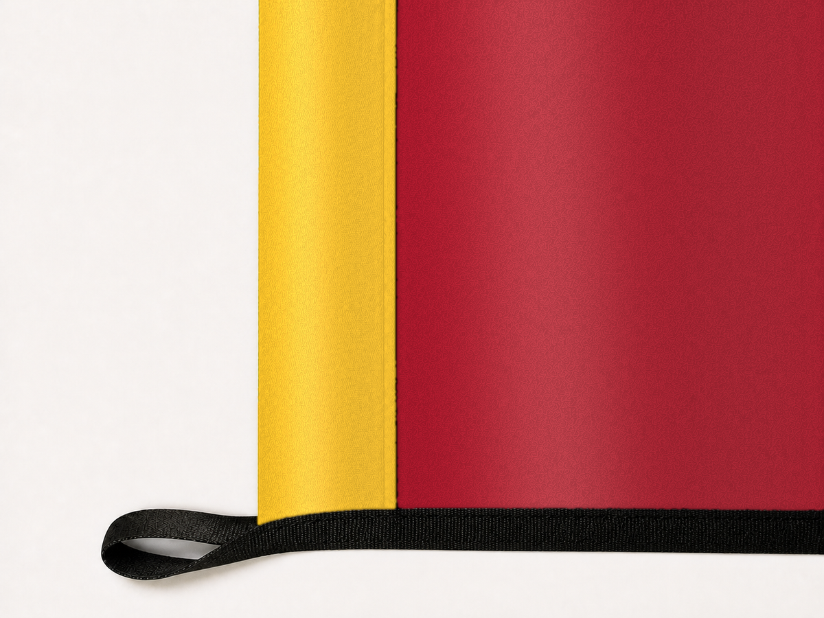 Iowa State Cyclones Authentic Gameday Flag underside and personalization construction view — continuous restrained woven-satin Iowa State Cyclones Accent header, textured Iowa State Cyclones Primary face, lower black loop and perimeter webbing — source_sha256=877fb5408d98925bb58e99a6c7597598572f249ba409d8b19c1bf76d290a7565