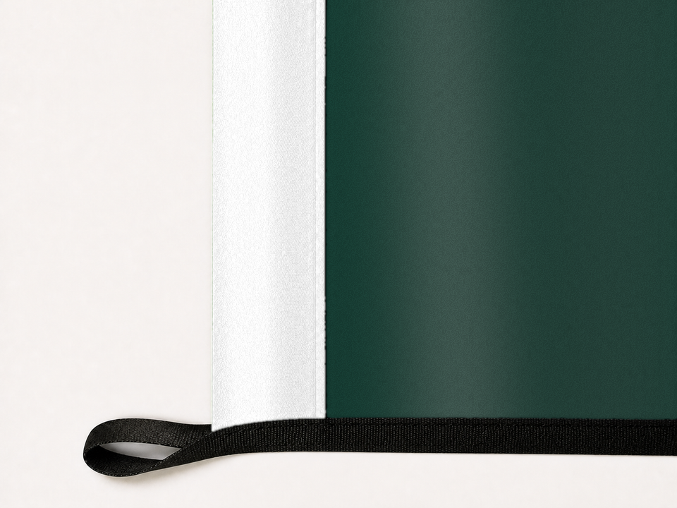 Michigan State Spartans Authentic Gameday Flag underside and personalization construction view — continuous restrained woven-satin Michigan State Spartans Accent header, textured Michigan State Spartans Primary face, lower black loop and perimeter webbing — source_sha256=40ee57b50c2a74ed4692f1a47de6d6068660fd249c70deb781e12b0917020b49