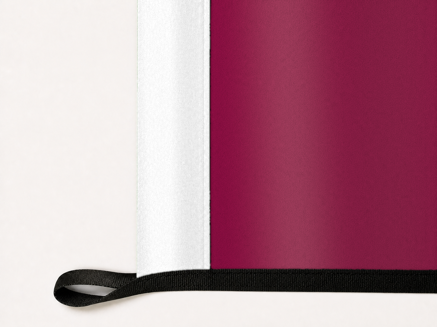 New Mexico State Aggies Authentic Gameday Flag underside and personalization construction view — continuous restrained woven-satin New Mexico State Aggies Accent header, textured New Mexico State Aggies Primary face, lower black loop and perimeter webbing — source_sha256=d62ef99004c24bd5236f5ce2bac3e1176d29fa7881ab79621dc2297e87fe0a2e