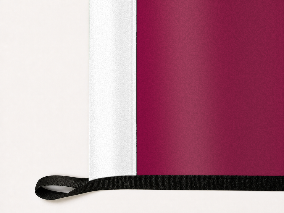 New Mexico State Aggies Authentic Gameday Flag underside and personalization construction view — continuous restrained woven-satin New Mexico State Aggies Accent header, textured New Mexico State Aggies Primary face, lower black loop and perimeter webbing — source_sha256=d62ef99004c24bd5236f5ce2bac3e1176d29fa7881ab79621dc2297e87fe0a2e