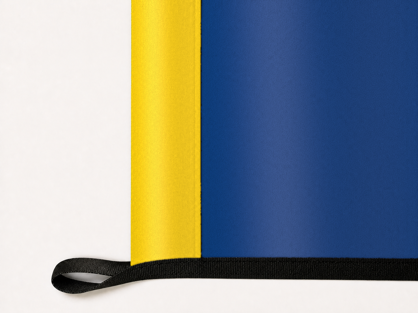 Toledo Rockets Authentic Gameday Flag underside and personalization construction view — continuous restrained woven-satin Toledo Rockets Accent header, textured Toledo Rockets Primary face, lower black loop and perimeter webbing — source_sha256=f19695c9e12aaafbc352ac5838d976009d5c8f4b593ef2e5e5a721d3c3764906