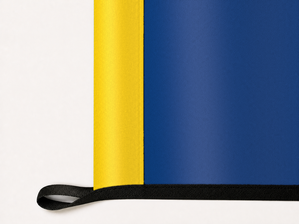 Toledo Rockets Authentic Gameday Flag underside and personalization construction view — continuous restrained woven-satin Toledo Rockets Accent header, textured Toledo Rockets Primary face, lower black loop and perimeter webbing — source_sha256=f19695c9e12aaafbc352ac5838d976009d5c8f4b593ef2e5e5a721d3c3764906