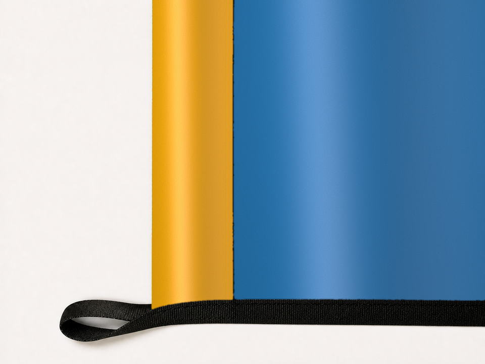 UCLA Bruins Authentic Gameday Flag underside and personalization construction view — continuous restrained woven-satin UCLA Bruins Accent header, textured UCLA Bruins Primary face, lower black loop and perimeter webbing — source_sha256=d6cb00244f1720a4dddf04dcd1eec8bc819ee49c4303401907974c9374f0d7df