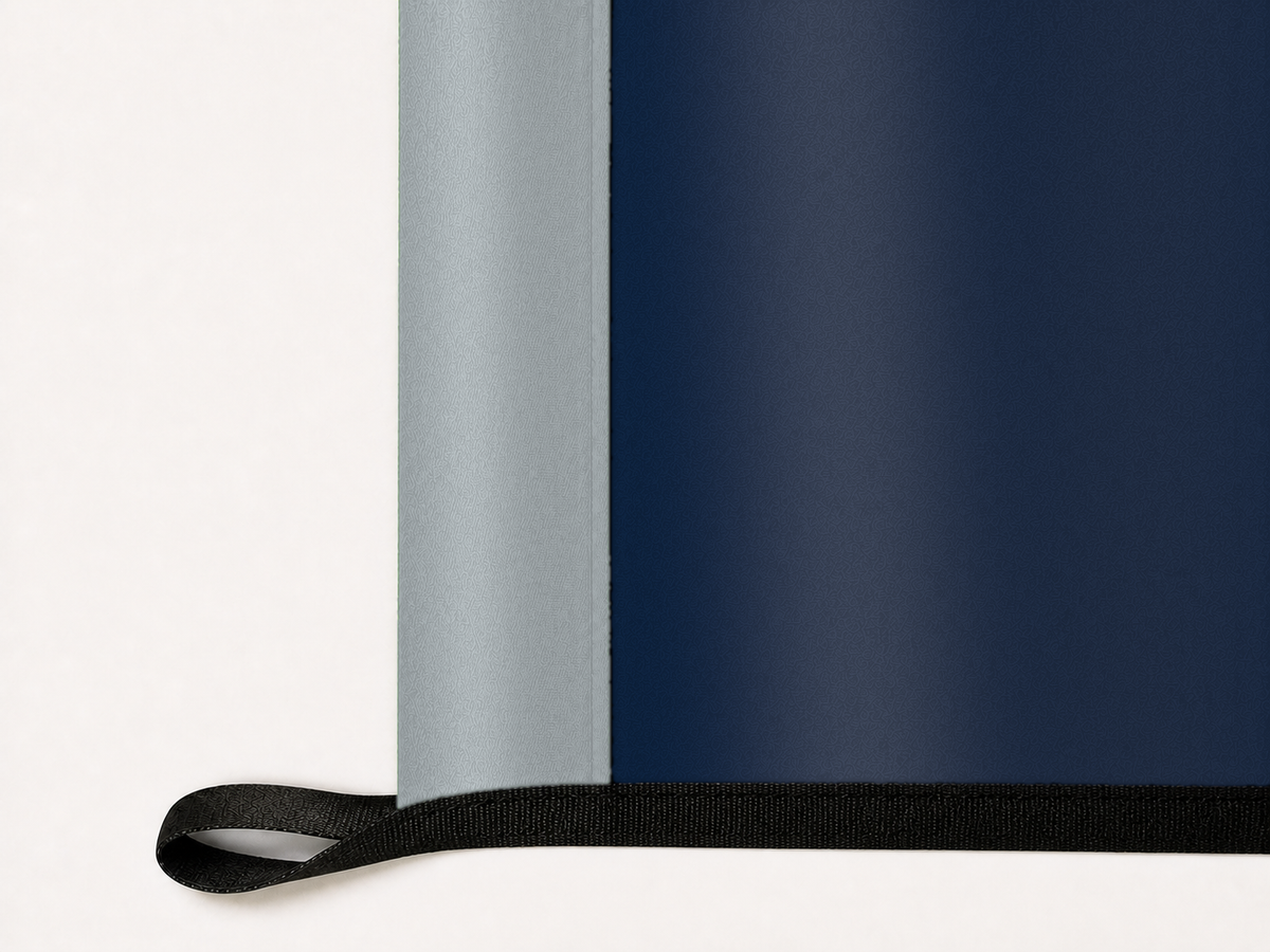 UConn Huskies Authentic Gameday Flag underside and personalization construction view — continuous restrained woven-satin UConn Huskies Accent header, textured UConn Huskies Primary face, lower black loop and perimeter webbing — source_sha256=38bef9a203747a6c7a82399a2d10acb748732fec0bd03b9902b93d6b49a7dc61