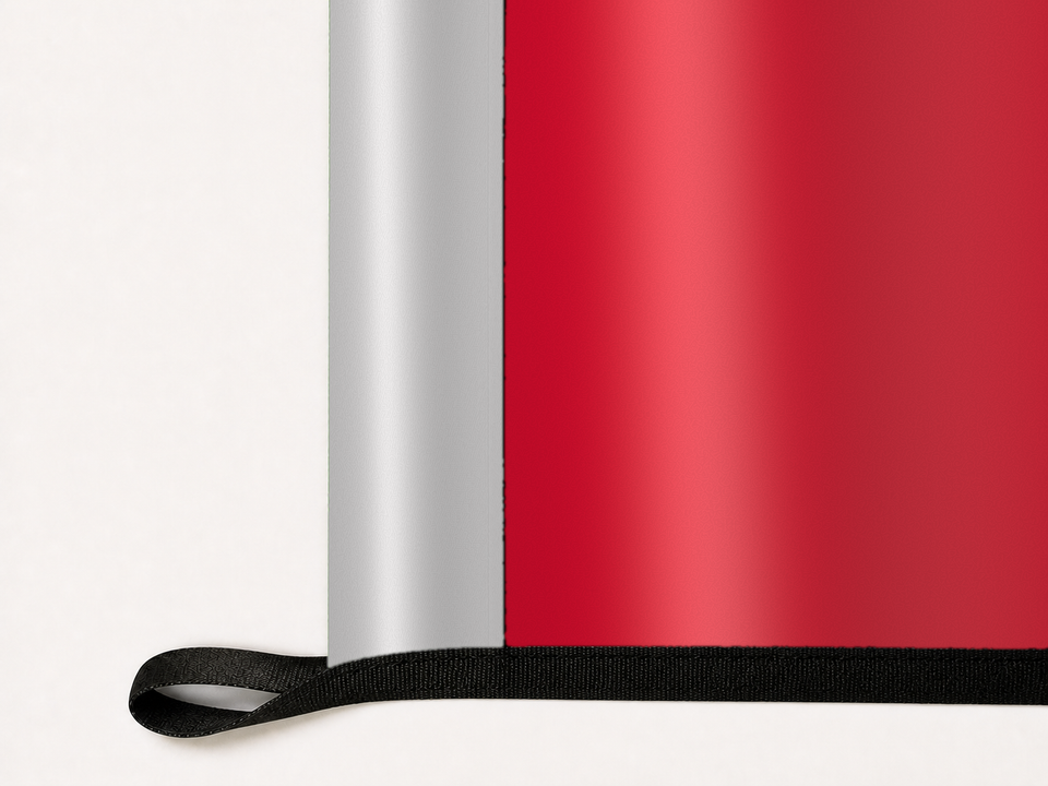UNLV Rebels Authentic Gameday Flag underside and personalization construction view — continuous restrained woven-satin UNLV Rebels Accent header, textured UNLV Rebels Primary face, lower black loop and perimeter webbing — source_sha256=b8261cab81c7e0168da0f1c58583314f135df1891eb18a4f39197d012b8f65f9