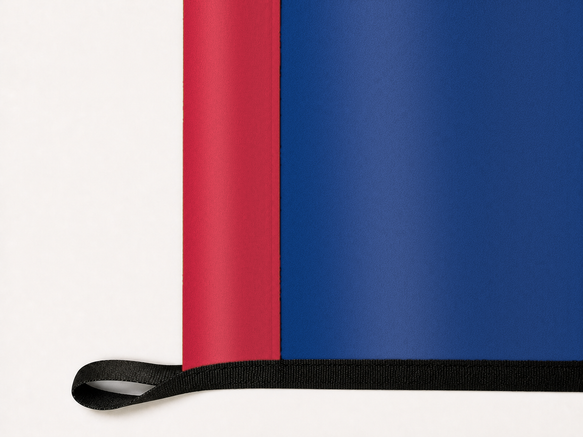 New York Giants Authentic Gameday Flag underside and personalization construction view — continuous restrained woven-satin New York Giants Accent header, textured New York Giants Primary face, lower black loop and perimeter webbing — source_sha256=287e3a07646a5efae5154b7e7db2445c969049ad5eafe6c595d8488ee4813a9a