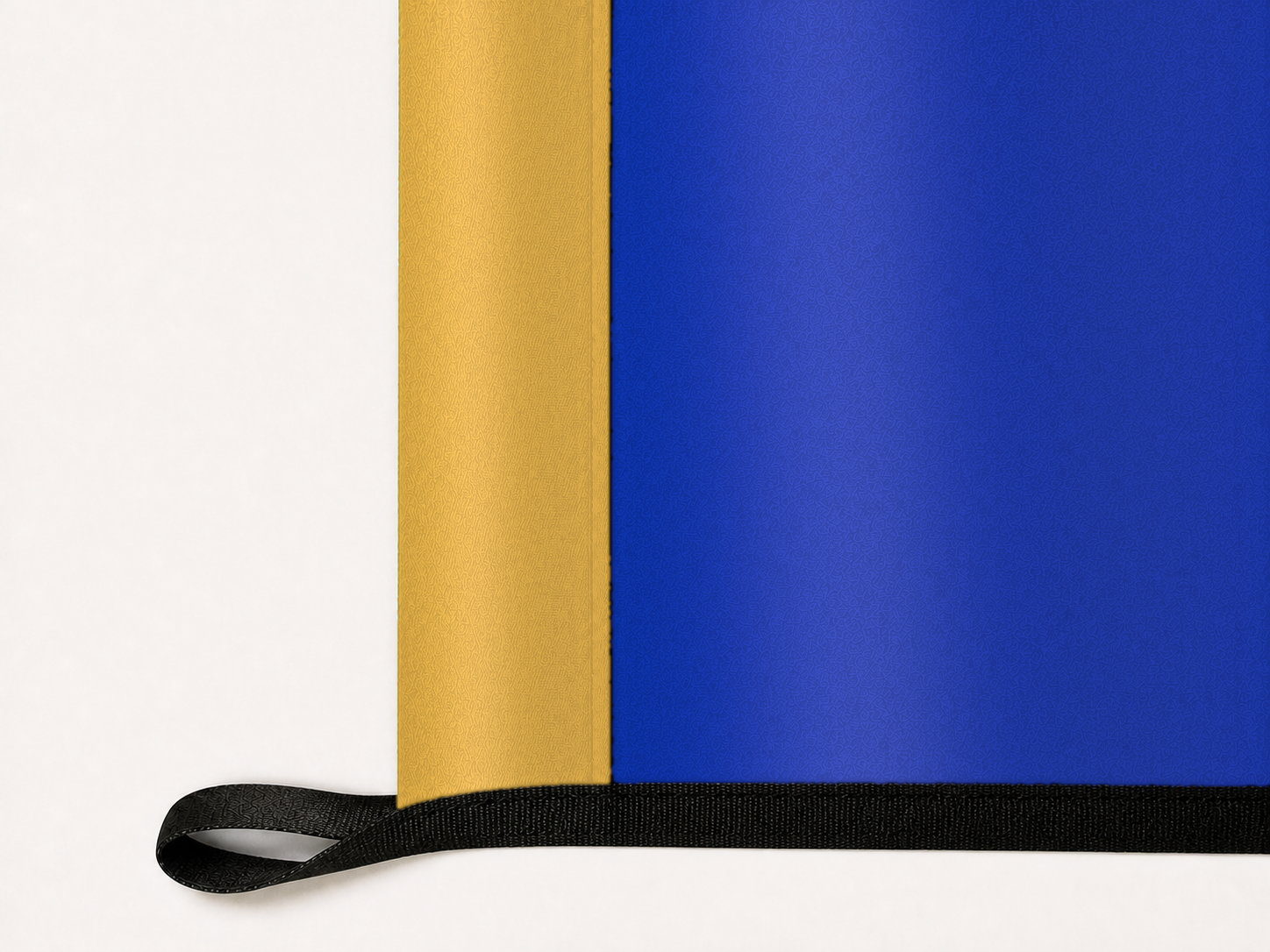 Nevada State Flag Authentic Gameday Flag underside and personalization construction view — continuous restrained woven-satin Nevada State Flag Accent header, textured Nevada State Flag Primary face, lower black loop and perimeter webbing — source_sha256=556fefef2ac546483a17ac9d24c162e482815befcde1b9c3d31156cde28d9a9a