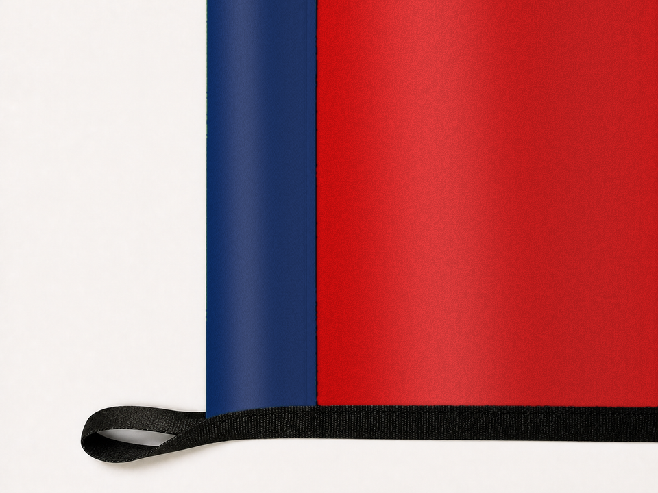 Tennessee State Flag Authentic Gameday Flag underside and personalization construction view — continuous restrained woven-satin Tennessee State Flag Accent header, textured Tennessee State Flag Primary face, lower black loop and perimeter webbing — source_sha256=c2e356f6687d682ccb9356b5c2d66b9fca4a78b7a05e50b3c793513cf302276f