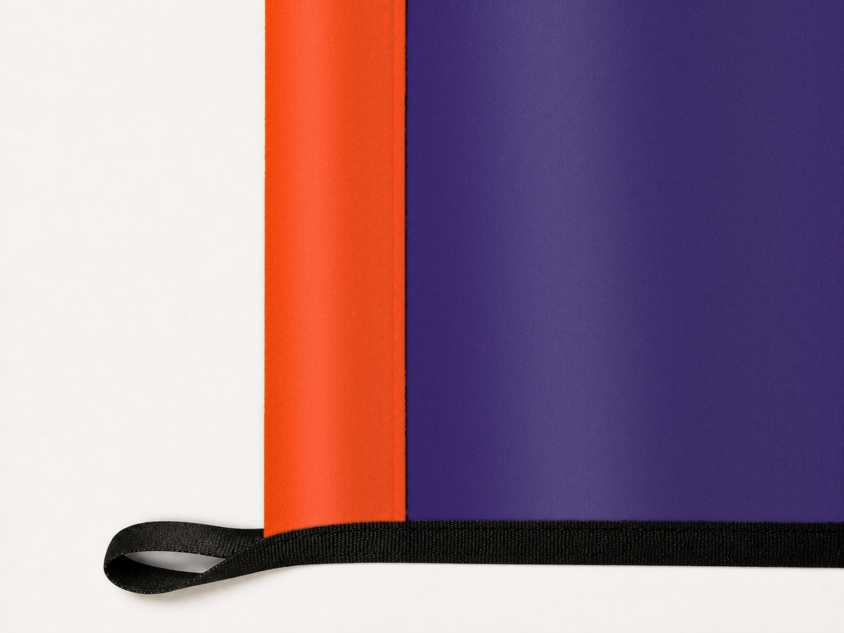 Phoenix Mercury Authentic Gameday Flag underside and personalization construction view — continuous restrained woven-satin Phoenix Mercury Accent header, textured Phoenix Mercury Primary face, lower black loop and perimeter webbing — source_sha256=392b6e95e934dcb93ceea240e20b472b6d997eb7bbbc2a277ac6f88dc21d70e3