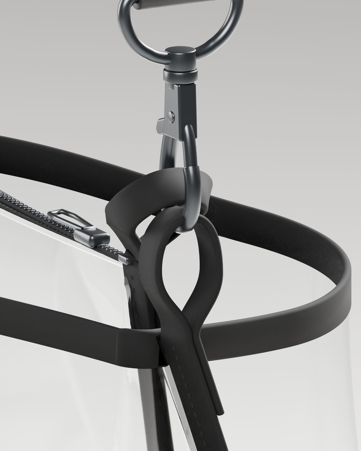 Shared strap connection · short compact clutch loop beside the original bucket loop