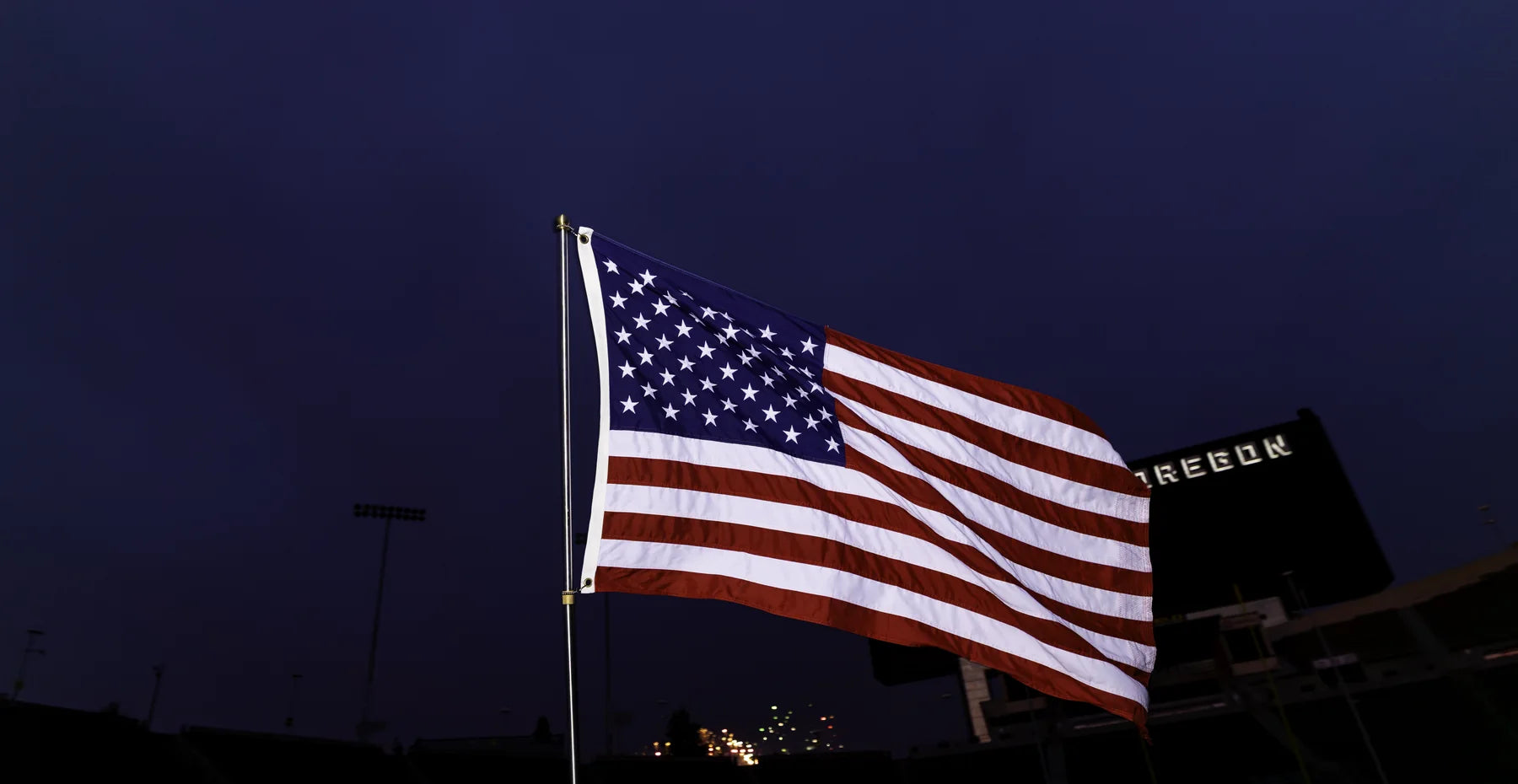 United States flag and compact Gameday MVP flagpole at Autzen Stadium