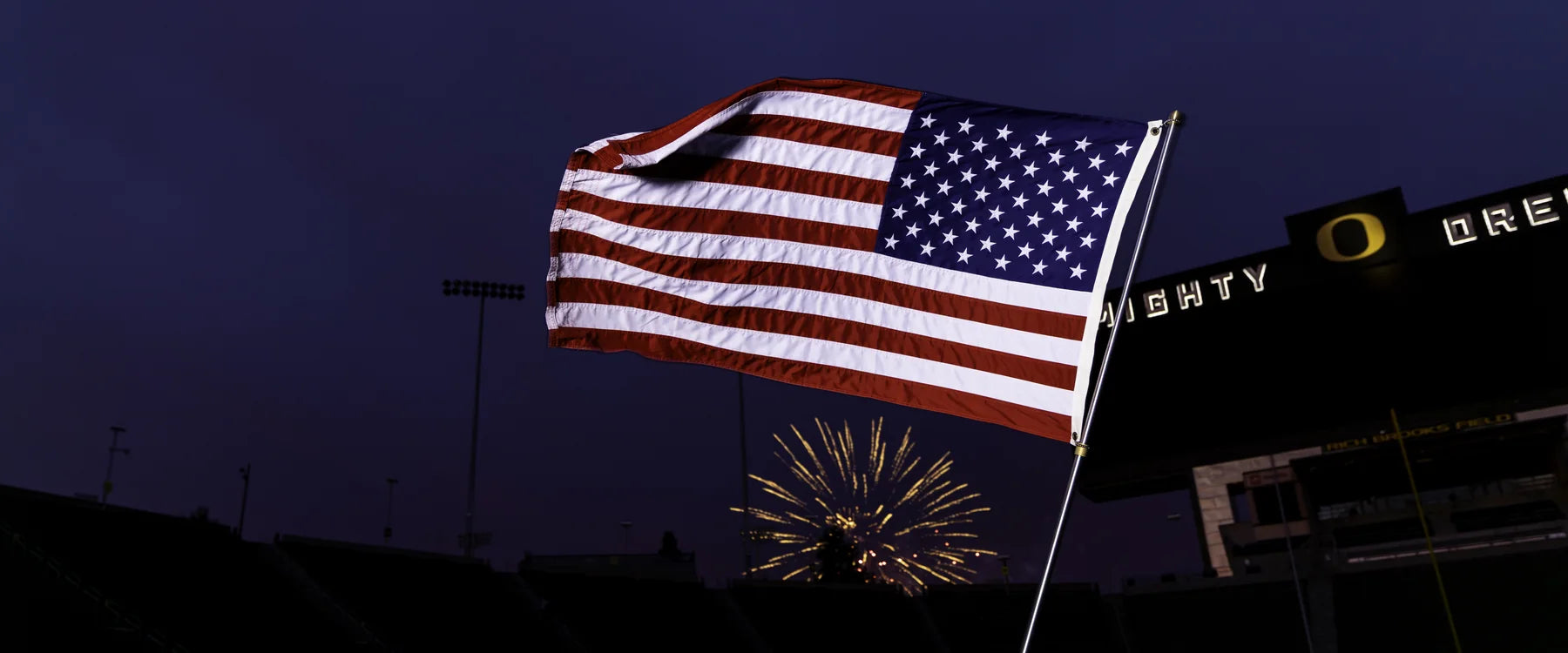 United States flag flying above Autzen Stadium during the owner-supplied Gameday Flags America 250 photoshoot