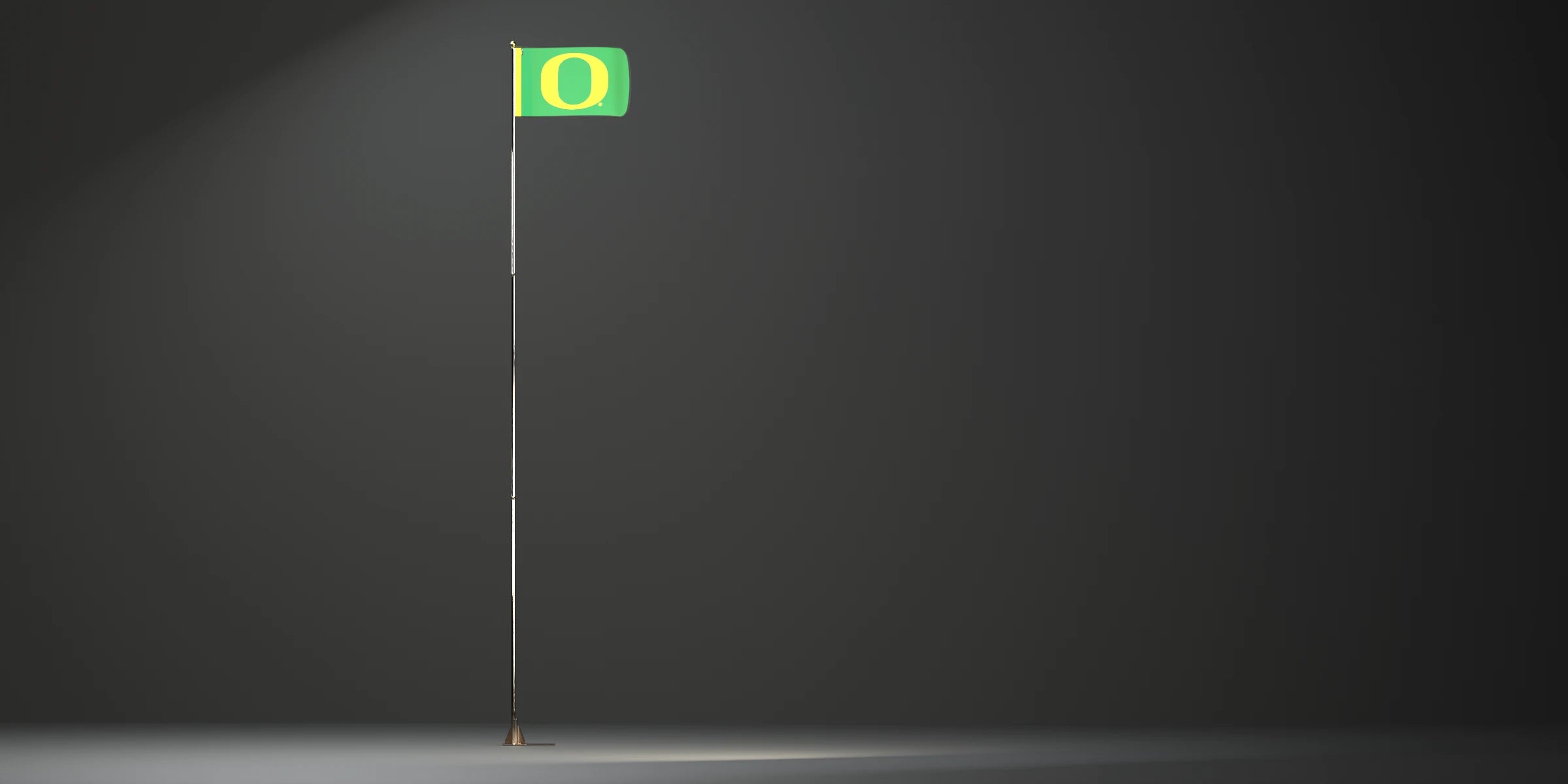Fully deployed Gameday EXT flagpole with an Oregon flag on a dark studio background