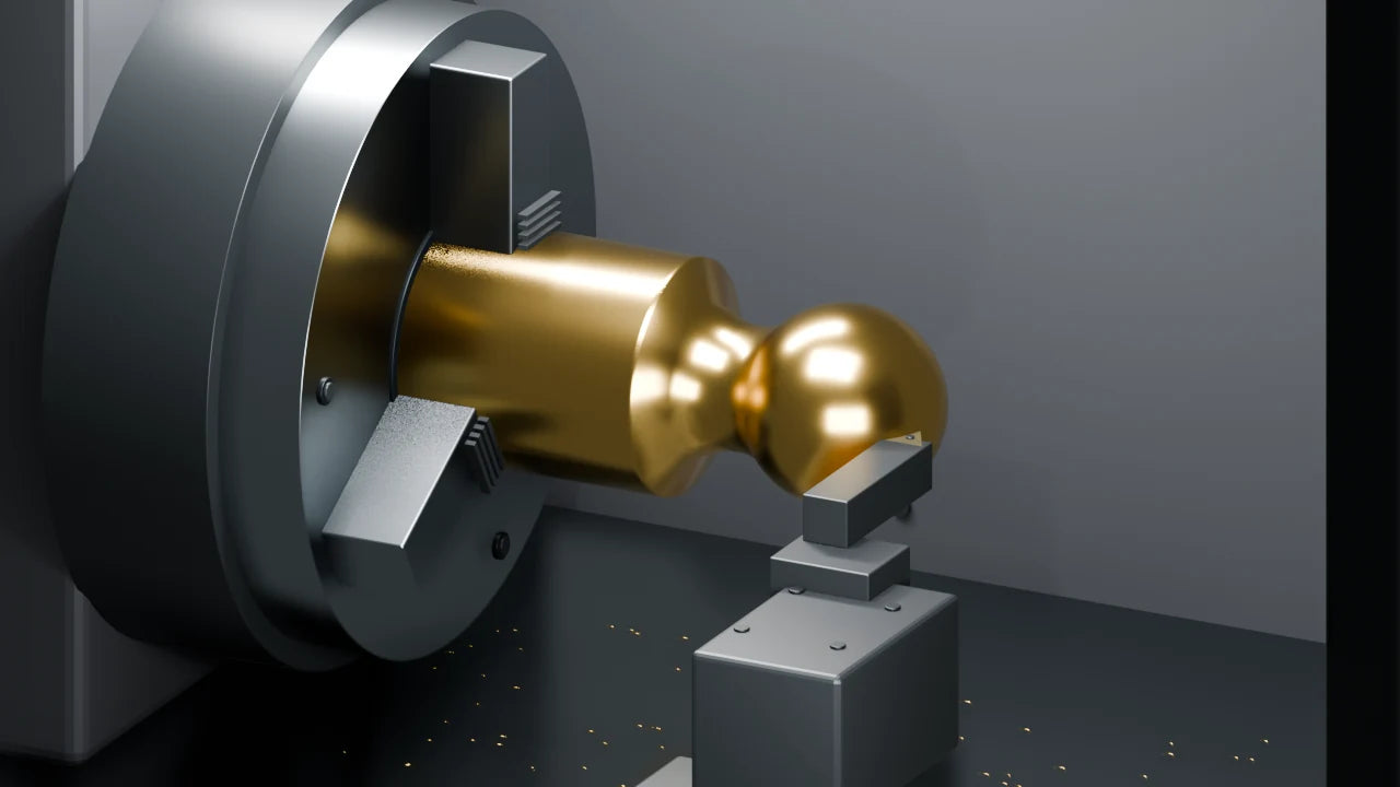 Brass ball being finish-machined in a CNC lathe